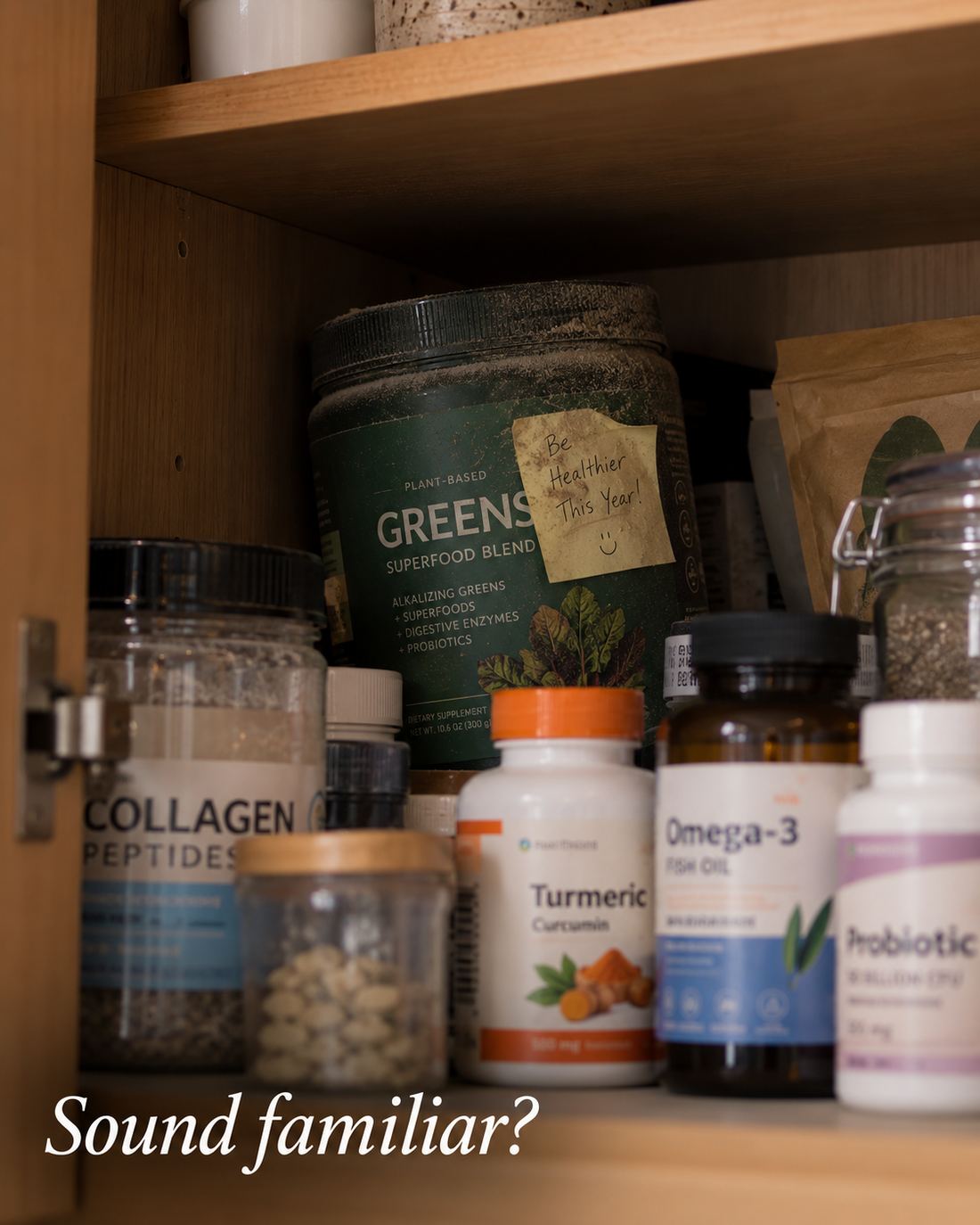 Crowded supplement cabinet with dusty greens powder and sticky note saying Be Healthier This Year — Sound familiar?